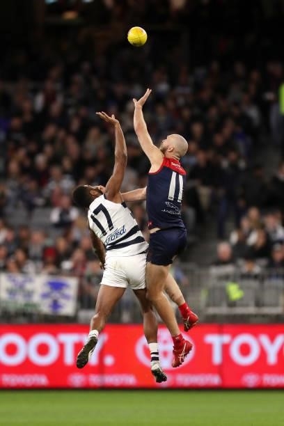 Esava Ratugolea of the Cats contests a ruck with Max Gawn of the Demons during the 2021 AFL First Preliminary Final match between the Melbourne...