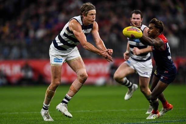 Rhys Stanley of the Cats handpasses the ball during the 2021 AFL First Preliminary Final match between the Melbourne Demons and the Geelong Cats at...