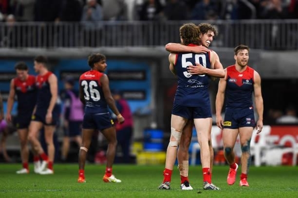 Ben Brown and Luke Jackson of the Demons happy with his team's win on the final siren during the 2021 AFL First Preliminary Final match between the...