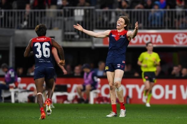 Kysaiah Pickett and Ben Brown of the Demons celebrate the win on the final siren during the 2021 AFL First Preliminary Final match between the...