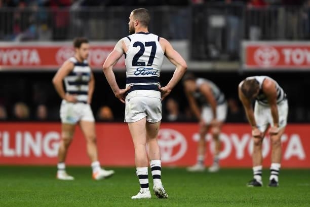 Sam Menegola of the Cats looks dejects with the loss on the final siren during the 2021 AFL First Preliminary Final match between the Melbourne...