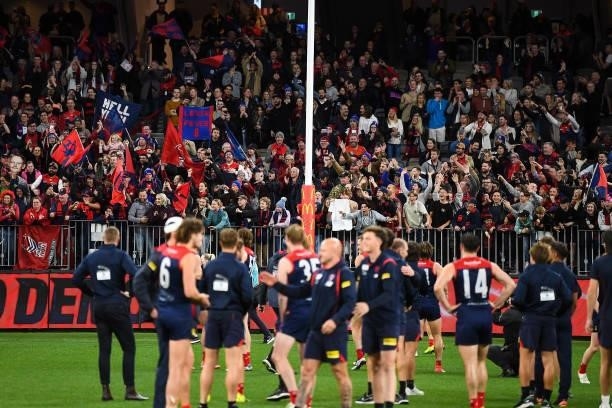 Demons fans cheer their team off after the win during the 2021 AFL First Preliminary Final match between the Melbourne Demons and the Geelong Cats at...