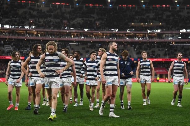 Geelong look dejected after the loss during the 2021 AFL First Preliminary Final match between the Melbourne Demons and the Geelong Cats at Optus...