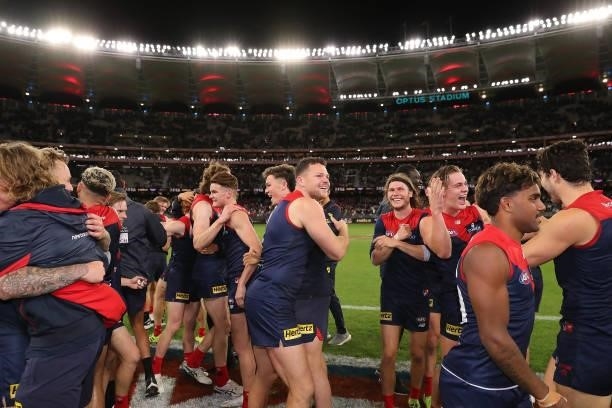 The Demons celebrate after the win during the 2021 AFL First Preliminary Final match between the Melbourne Demons and the Geelong Cats at Optus...