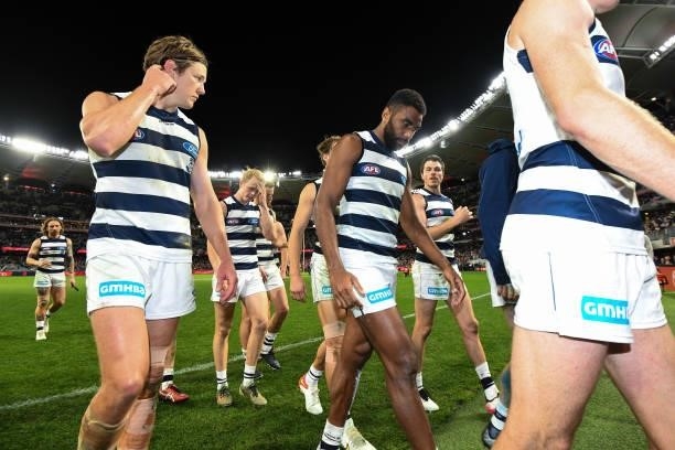 Esava Ratugolea of the Cats leaves the field after the los during the 2021 AFL First Preliminary Final match between the Melbourne Demons and the...