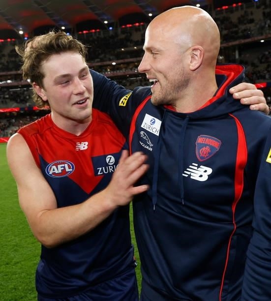 Tom Sparrow and Nathan Jones of the Demons celebrate during the 2021 AFL First Preliminary Final match between the Melbourne Demons and the Geelong...