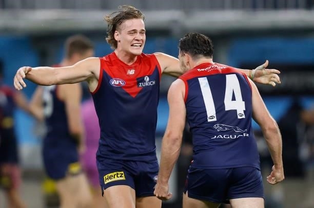 Michael Hibberd and Trent Rivers of the Demons celebrate during the 2021 AFL First Preliminary Final match between the Melbourne Demons and the...