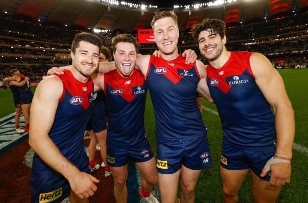 Alex Neal-Bullen, Tom Sparrow, Tom McDonald and Christian Petracca of the Demons celebrate during the 2021 AFL First Preliminary Final match between...