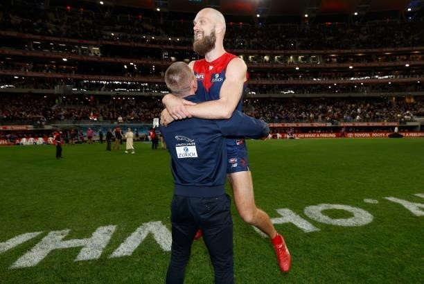 Adam Tomlinson of the Demons and Max Gawn of the Demons celebrate during the 2021 AFL First Preliminary Final match between the Melbourne Demons and...