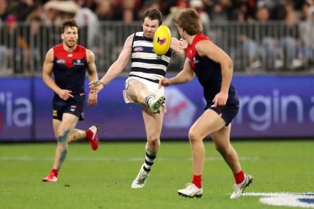 Patrick Dangerfield of the Cats kicks the ball during the 2021 AFL First Preliminary Final match between the Melbourne Demons and the Geelong Cats at...