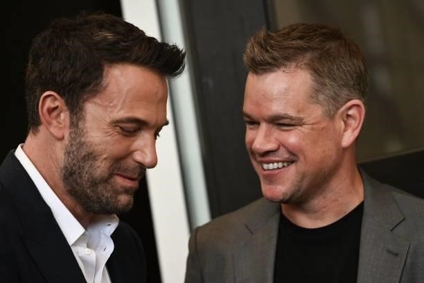 Actor Ben Affleck and US actor Matt Damon attend a photocall for the film "The Last Duel