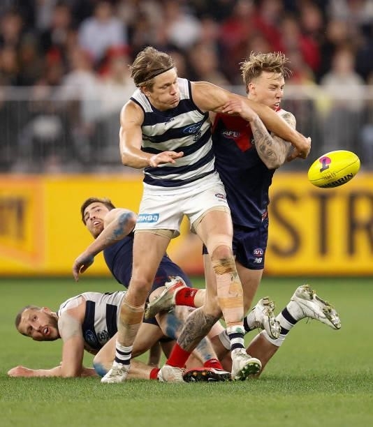 Rhys Stanley of the Cats and James Harmes of the Demons compete for the ball during the 2021 AFL First Preliminary Final match between the Melbourne...