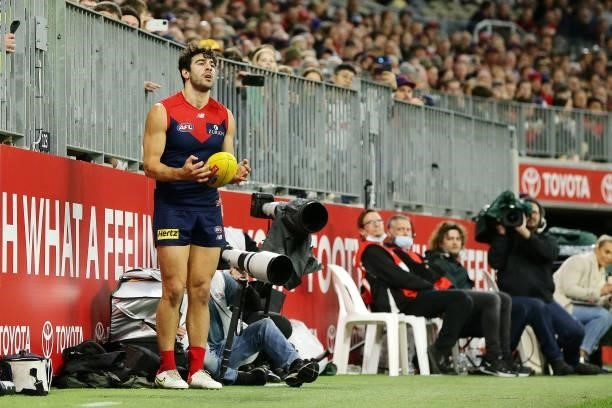 Christian Petracca of the Demons lines up a kick on goal during the 2021 AFL First Preliminary Final match between the Melbourne Demons and the...