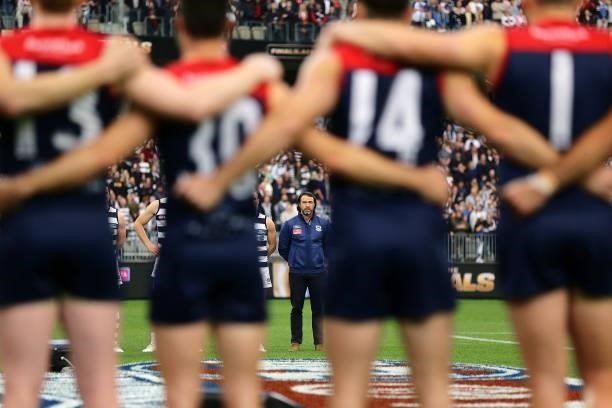 Chris Scott, Senior Coach of the Cats looks on at the Welcome to country during the 2021 AFL First Preliminary Final match between the Melbourne...