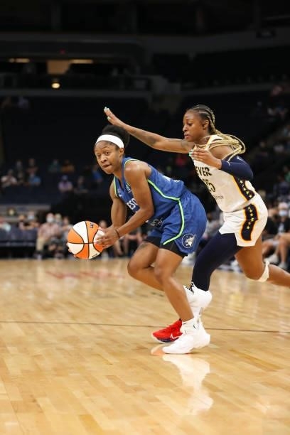 Crystal Dangerfield of the Minnesota Lynx handles the ball during the game against the Indiana Fever on September 10, 2021 at Target Center in...