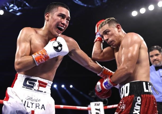 Gabriel Flores Jr and Luis Alberto Lopez exchange punches during their fight at Casino del Sol on September 10, 2021 in Tucson, Arizona.