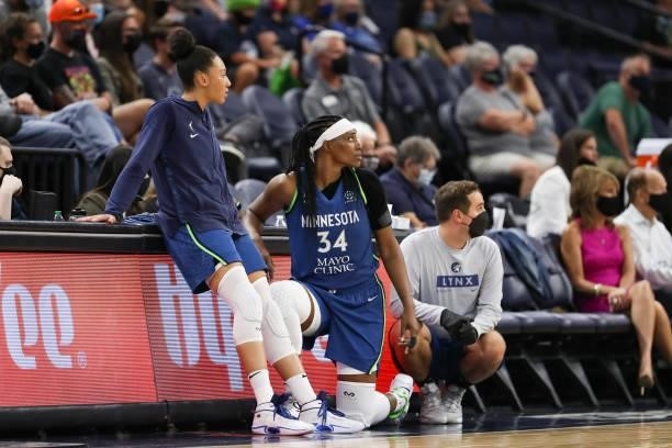 Aerial Powers of the Minnesota Lynx and Sylvia Fowles of the Minnesota Lynx look on during the game against the Indiana Fever on September 10, 2021...