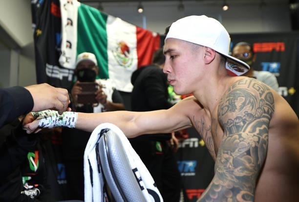 Super featherweight champion Oscar Valdez gets his hands wrapped before his fight against Robson Conceição at Casino del Sol on September 10, 2021 in...