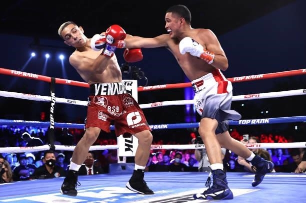Luis Alberto Lopez and Gabriel Flores Jr exchange punches during their fight at Casino del Sol on September 10, 2021 in Tucson, Arizona.