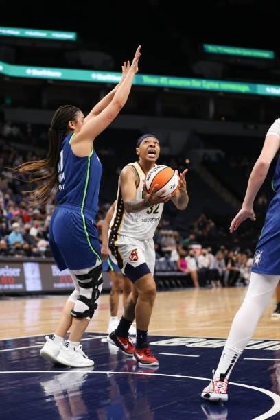 Emma Cannon of the Indiana Fever drives to the basket during the game against the Minnesota Lynx on September 10, 2021 at Target Center in...