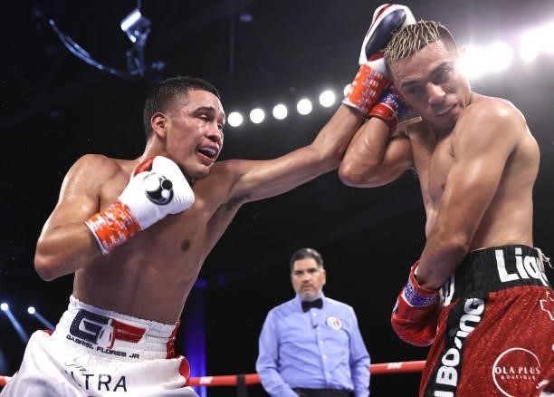 Gabriel Flores Jr and Luis Alberto Lopez exchange punches during their fight at Casino del Sol on September 10, 2021 in Tucson, Arizona.