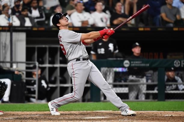 Bobby Dalbec of the Boston Red Sox hits a triple in the seventh inning against the Chicago White Sox at Guaranteed Rate Field on September 10, 2021...