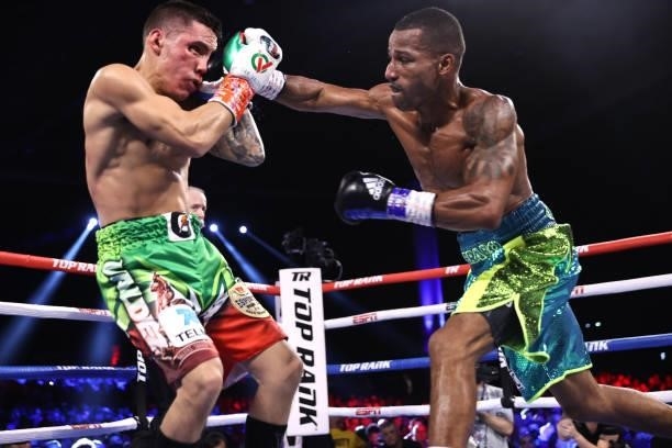 Oscar Valdez and Robson Conceição exchange punches during their fight for the WBC super featherweight championship at Casino del Sol on September 10,...