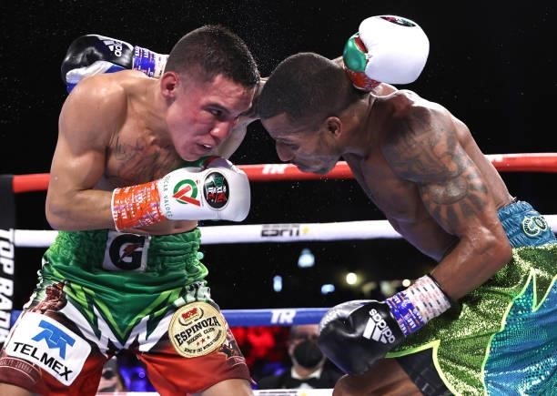 Oscar Valdez and Robson Conceição exchange punches during their fight for the WBC super featherweight championship at Casino del Sol on September 10,...