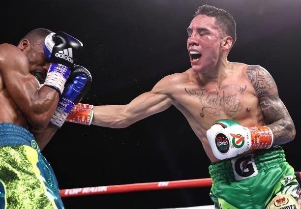 Robson Conceição and Oscar Valdez exchange punches during their fight for the WBC super featherweight championship at Casino del Sol on September 10,...