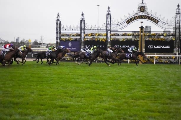 Floating Artist ridden by Teodore Nugent wins the Very Special Kids Pin and Win Plate at Flemington Racecourse on September 11, 2021 in Flemington,...