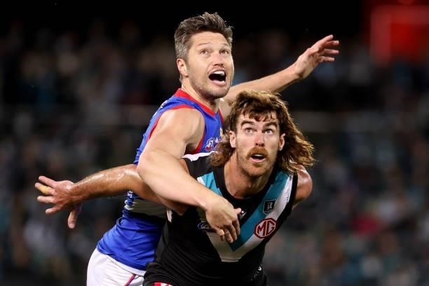 Stefan Martin of the Bulldogs competes with Scott Lycett of the Power during the 2021 AFL Second Preliminary Final match between the Port Adelaide...