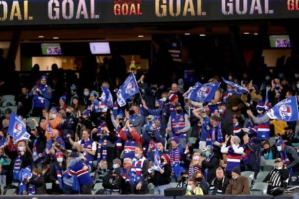 Bulldogs fans celebrate a goal during the 2021 AFL Second Preliminary Final match between the Port Adelaide Power and the Western Bulldogs at...