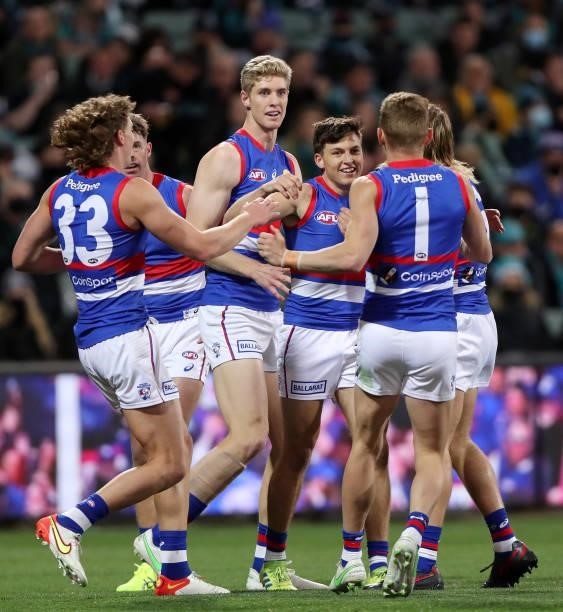 Laitham Vandermeer of the Bulldogs celebrates a goal with team mates during the 2021 AFL Second Preliminary Final match between the Port Adelaide...