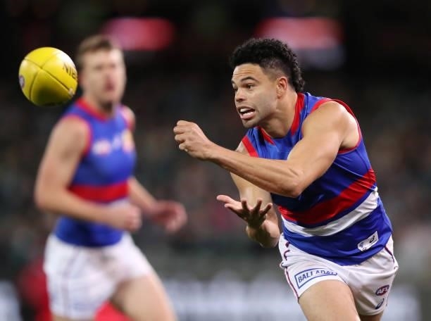 Jason Johannisen of the Bulldogs handpasses the ball during the 2021 AFL Second Preliminary Final match between the Port Adelaide Power and the...