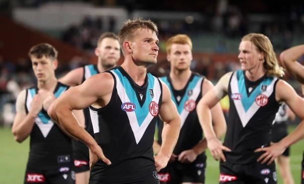 An emotional Ollie Wines of the Power with team mates after the loss during the 2021 AFL Second Preliminary Final match between the Port Adelaide...