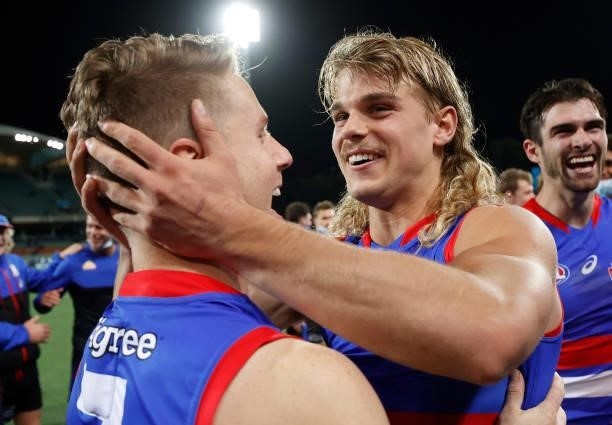 Lachie Hunter and Bailey Smith of the Bulldogs celebrate during the 2021 AFL Second Preliminary Final match between the Port Adelaide Power and the...