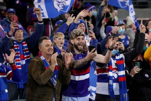 Bulldogs fans celebrate their win during the 2021 AFL Second Preliminary Final match between the Port Adelaide Power and the Western Bulldogs at...