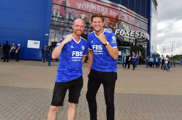 Leicester City fans arrive ahead of the Premier League match between Leicester City and Manchester City at King Power Stadium on September 11, 2021...