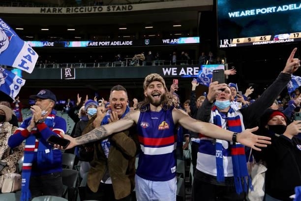 Bulldogs fans celebrate their win during the 2021 AFL Second Preliminary Final match between the Port Adelaide Power and the Western Bulldogs at...