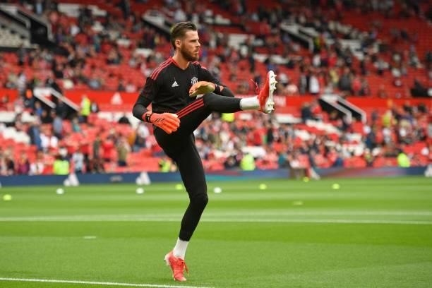 Manchester United's Spanish goalkeeper David de Gea warms up ahead of the English Premier League football match between Manchester United and...