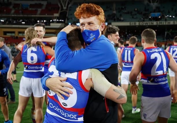 Caleb Daniel and Ed Richards of the Bulldogs celebrate during the 2021 AFL Second Preliminary Final match between the Port Adelaide Power and the...