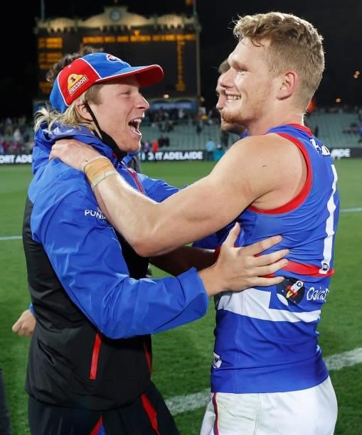 Cody Weightman and Adam Treloar of the Bulldogs celebrate during the 2021 AFL Second Preliminary Final match between the Port Adelaide Power and the...