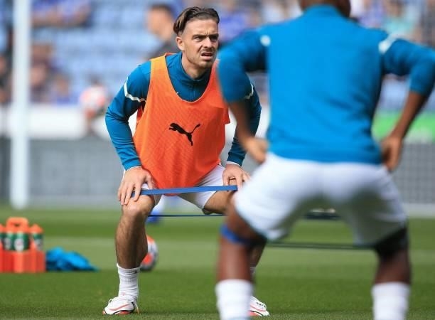 Manchester City's English midfielder Jack Grealish warms up ahead of the English Premier League football match between Leicester City and Manchester...