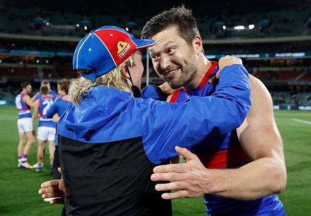 Cody Weightman and Stefan Martin of the Bulldogs celebrate during the 2021 AFL Second Preliminary Final match between the Port Adelaide Power and the...