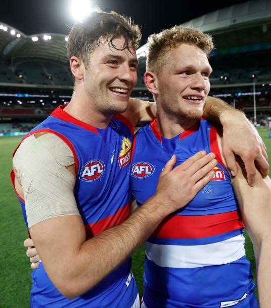 Josh Dunkley and Adam Treloar of the Bulldogs celebrate during the 2021 AFL Second Preliminary Final match between the Port Adelaide Power and the...