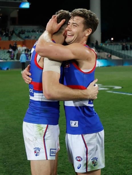Marcus Bontempelli and Josh Dunkley of the Bulldogs celebrate during the 2021 AFL Second Preliminary Final match between the Port Adelaide Power and...