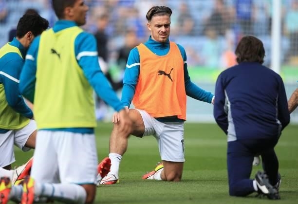 Manchester City's English midfielder Jack Grealish warms up ahead of the English Premier League football match between Leicester City and Manchester...