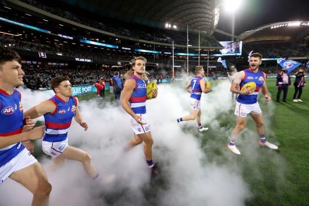 Marcus Bontempelli of the Bulldogs leads his team out during the 2021 AFL Second Preliminary Final match between the Port Adelaide Power and the...