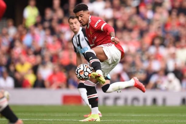 Manchester United's English striker Jadon Sancho controls the ball during the English Premier League football match between Manchester United and...