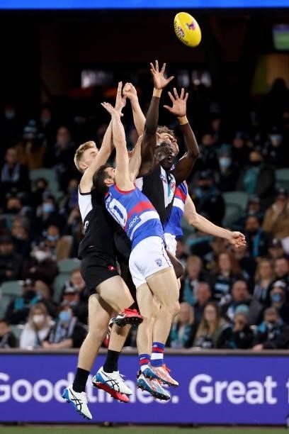Easton Wood of the Bulldogs competes with Aliir Aliir of the Power during the 2021 AFL Second Preliminary Final match between the Port Adelaide Power...